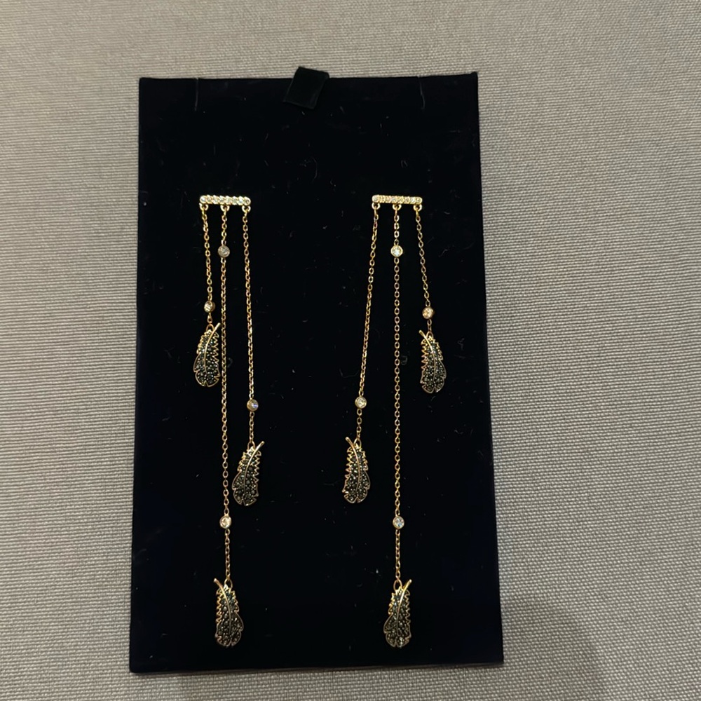 Swarovski earrings naughty feather dangle